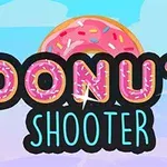 Egy rózsaszín, szórócukorkás fánk illusztrált háttér előtt, DONUT SHOOTER felirattal