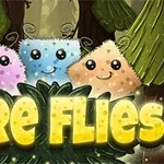 Három mosolygó, színes szőrös lény erdő háttérben, fénylő FIRE FLIES felirattal alattuk