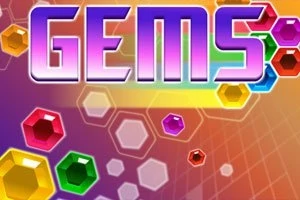 Színes, hatszögletű drágakövek és a „GEMS” felirat élénk háttér előtt