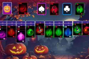 Halloween témájú kártyák és faragott töklámpások egy ködös, őszi táj előtt