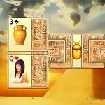 Kártyalapok egyiptomi témájú háttérrel és szimbólumokkal, például egy amfora, egy női alak, és az élet kulcsa jele