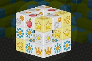 3x3-as kocka virág, csillag, fogaskerék, alma és korona mintákkal díszítve