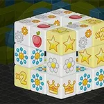 3x3-as kocka virág, csillag, fogaskerék, alma és korona mintákkal díszítve