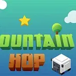 Zöld és kék háttér előtt Mountain Hop felirat látható, csillag, felhők, fa, kék madár és fehér kocka formájú figura társaságában