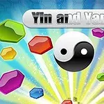 Színes hatszögletű kristályok veszik körül a középen elhelyezkedő jin-jang szimbólumot, amely felett a „Yin and Yang” felirat látható fényes háttérrel